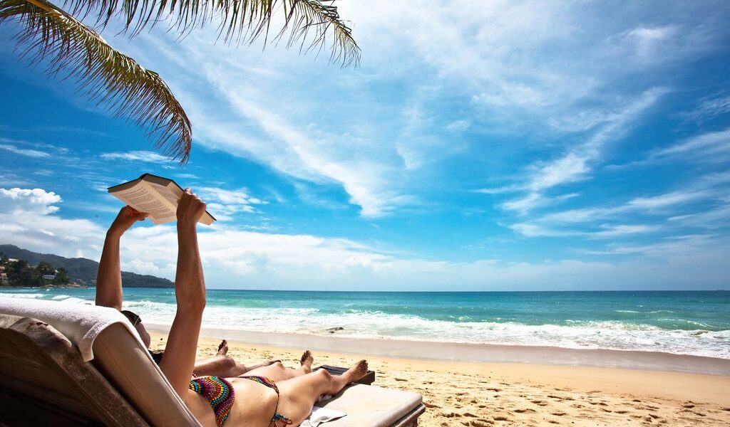 Relaxing and reading on the beach