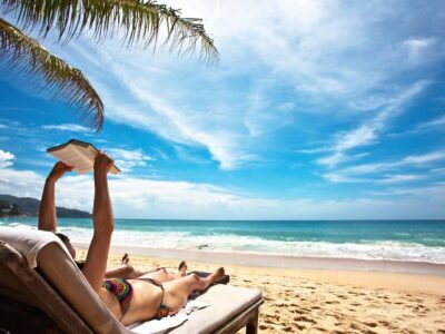 Relaxing and reading on the beach
