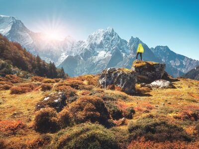 Standing Man On The Stone And Looking On Amazing Himalayan Mount