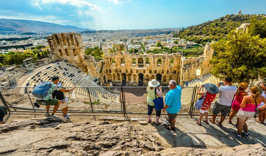 Athens, Greece - September 17 2017: Tourists Admire The Odeon Of