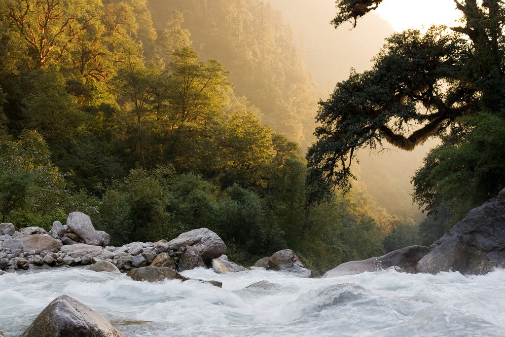 Sunset over a small river in Langtang