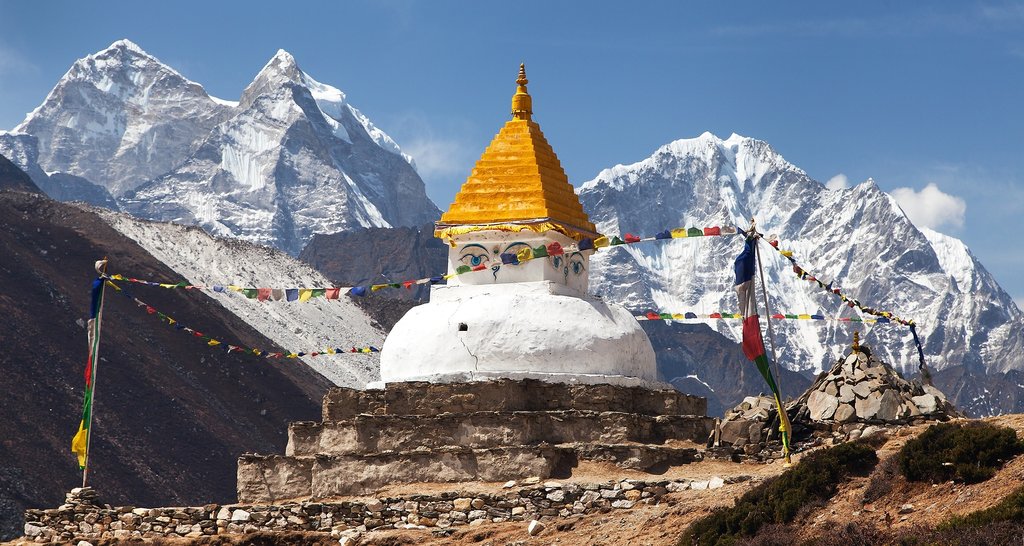 A Buddhist stupa in front of Mt. Thamserku