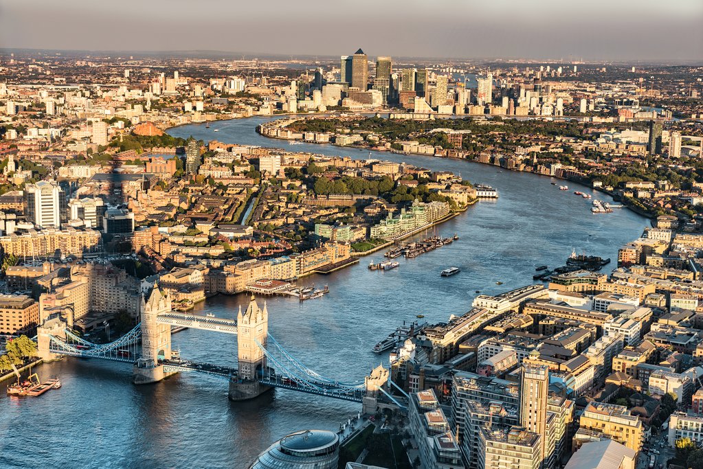 London city skyline aerial view at sunset with The Shard tower shadow, UK, Great Britain