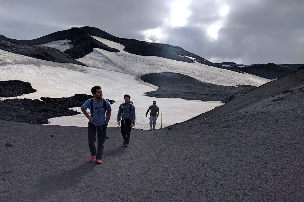 Crossing over pumice fields on newly create volcanic soil