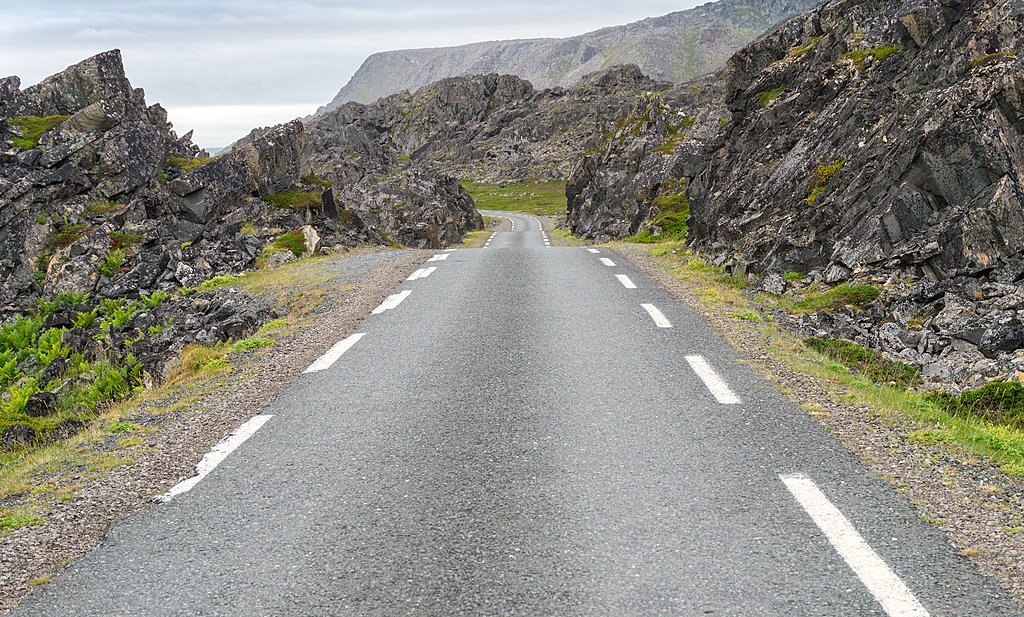 Drive on near-empty roads along the Barents Sea