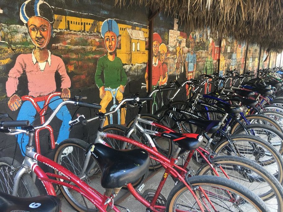 Soweto's street art and bicycles perched along the wall