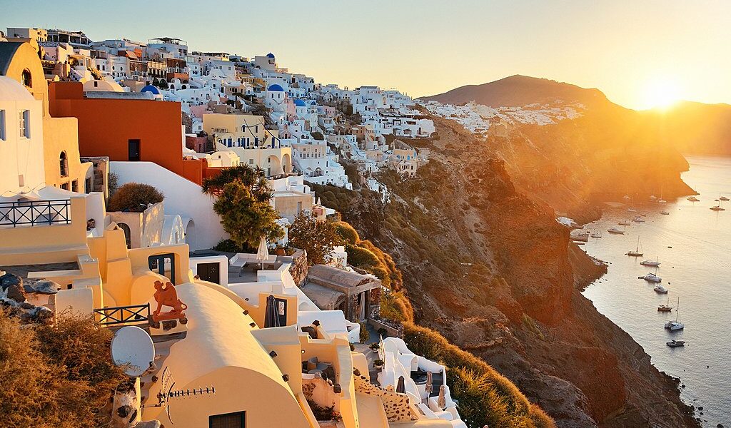 Santorini skyline sunrise with buildings in Greece.