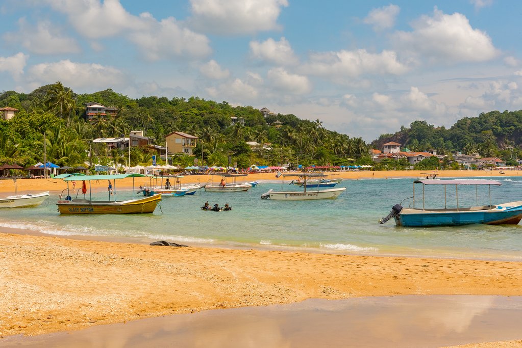 Spend the day relaxing on the sandy beaches of Unawatuna