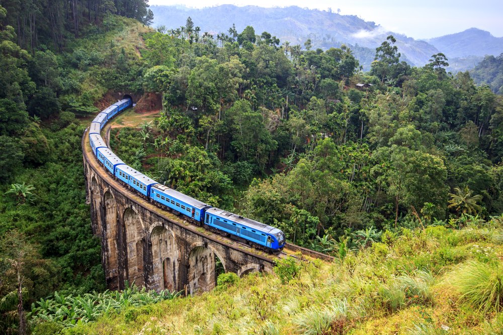 A Sri Lankan train winds through the jungle