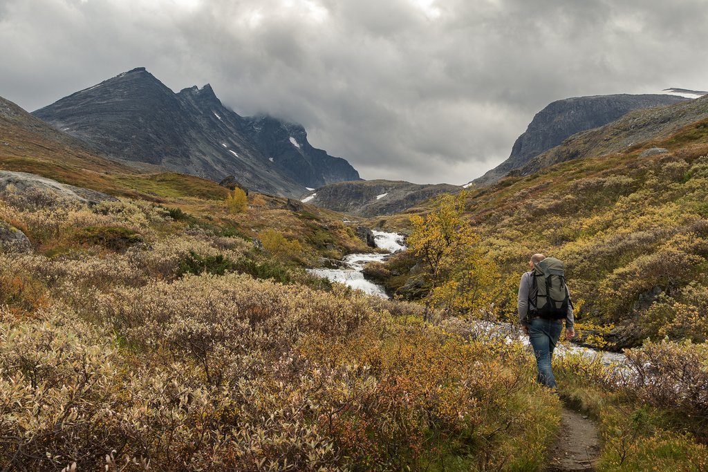 Follow the well-marked path that crosses rivers and streams.