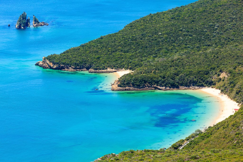 You can kayak in the calm waters of Arrábida Natural Park