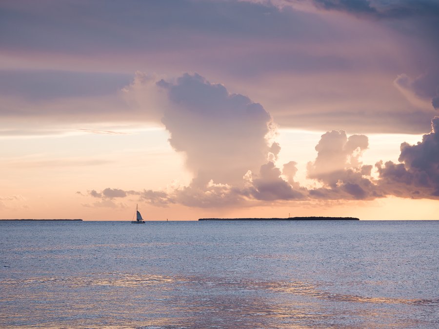 Toast to the sunset aboard a catamaran