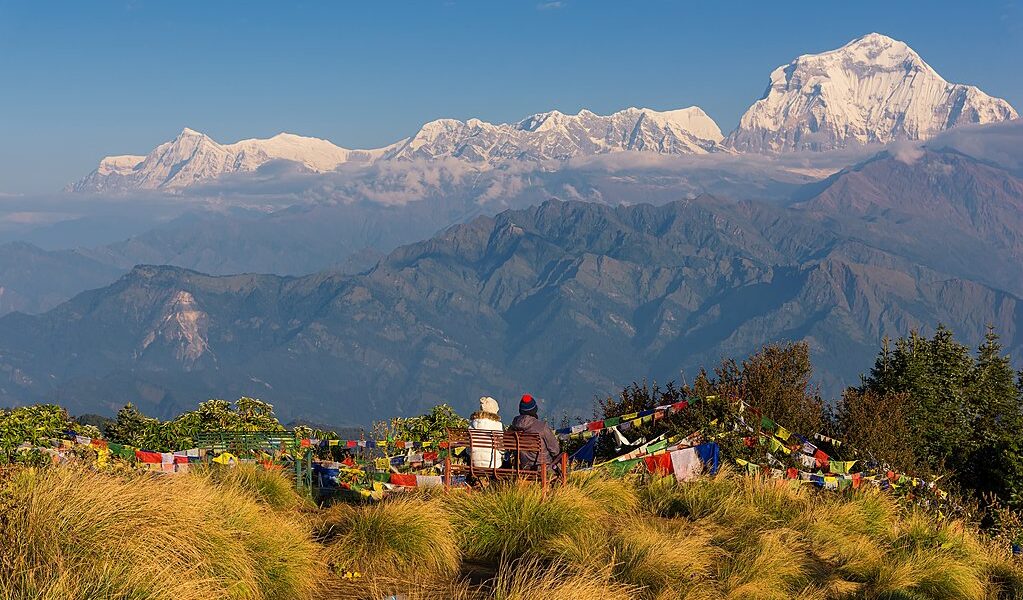 Couple watching the Mt. Dhaulagiri (8,172m) from Poonhill, Nepal.