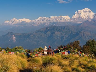 Couple watching the Mt. Dhaulagiri (8,172m) from Poonhill, Nepal.