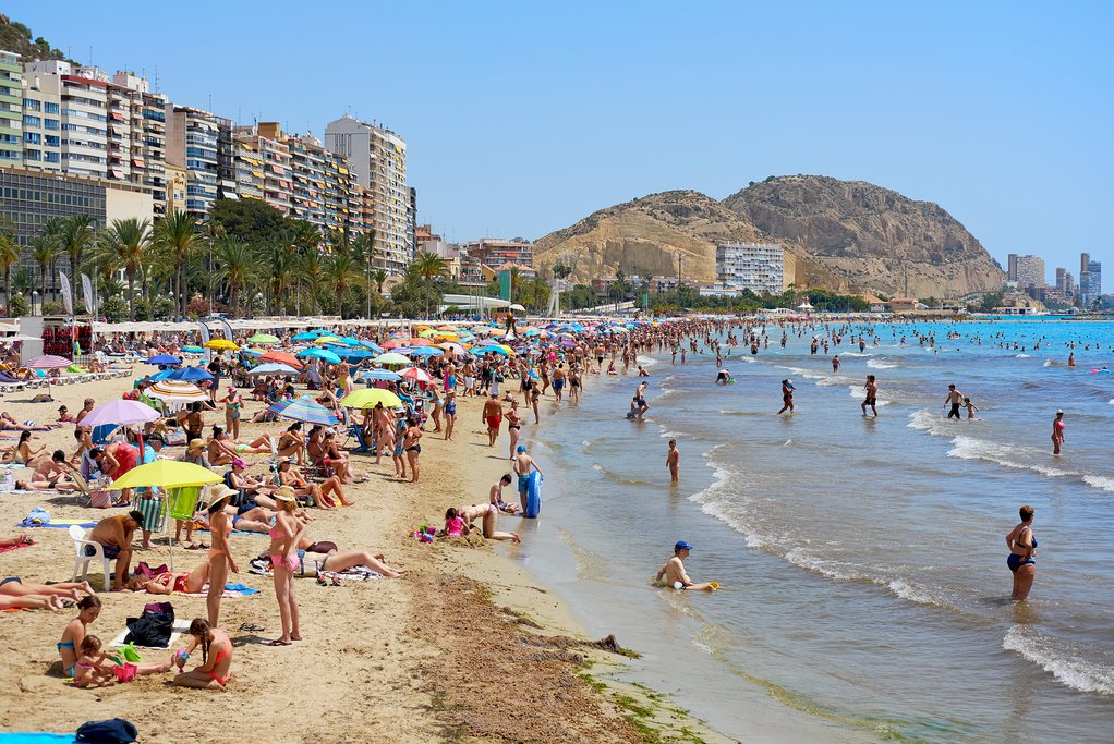 Sunbathing on Alicante's Postiguet Beach.