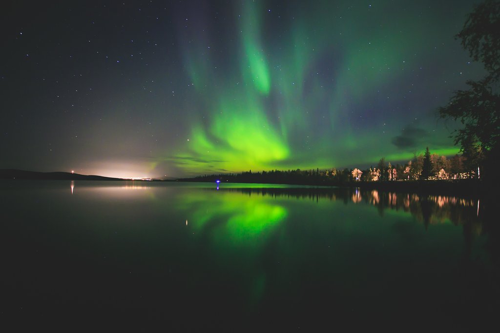 Northern lights over the water, Norway