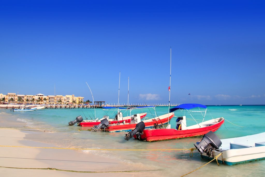 Boats on the shore in Playa del Carmen