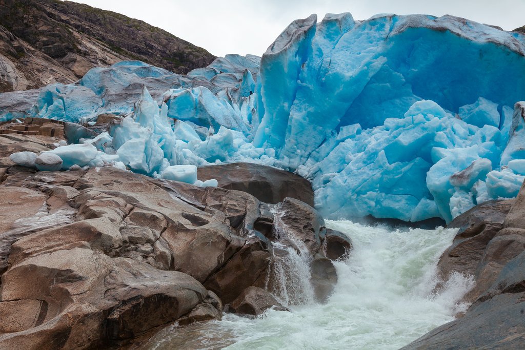 The beautiful Nigardsbreen Blue Ice Cave from outside
