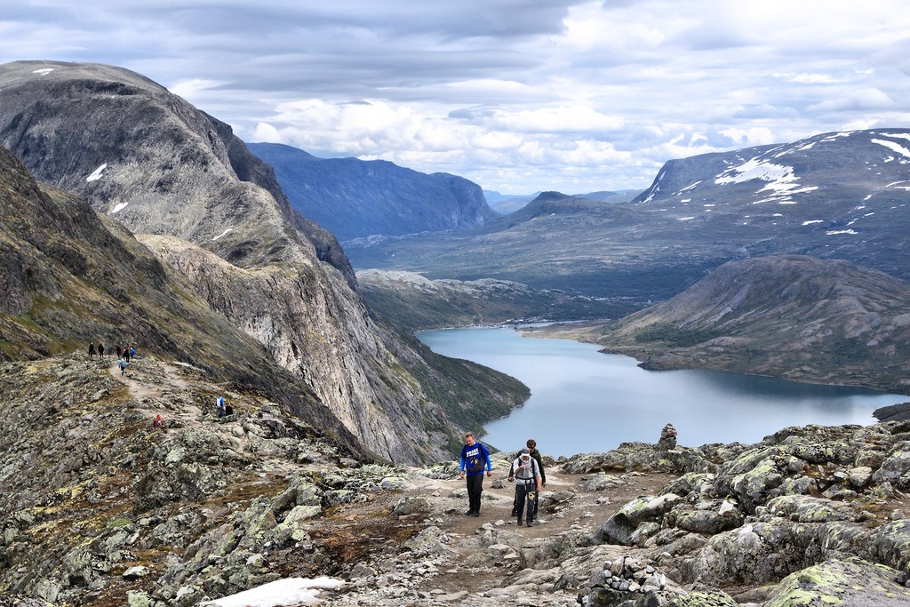 JOTUNHEIMEN NORWAY - AUGUST 1 2015/ People hike the Besseggen trail in Jotunheimen National Park Norway. Norway had almost 5 million foreign visitors in 2011.