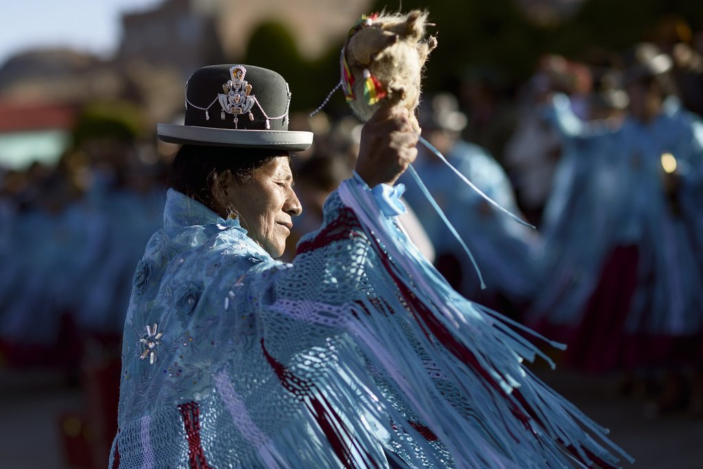 Aymara woman during the festival of the Virgen del Rosario, Chucuito