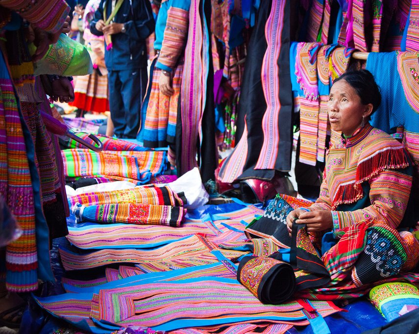 Clothing vendor at Bắc Hà Market