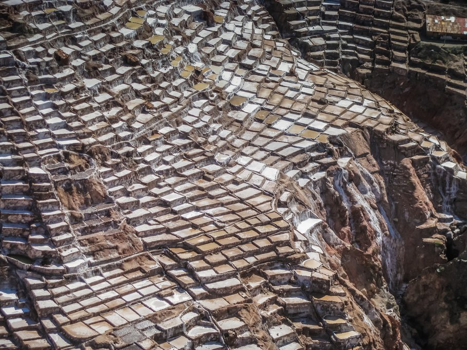 A view from above of Salineras, a patchwork of stone terraces used to harvest salt.