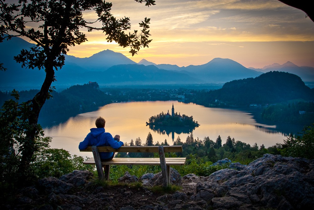 Explore Lake Bled by cycle, paddle boat, or on foot