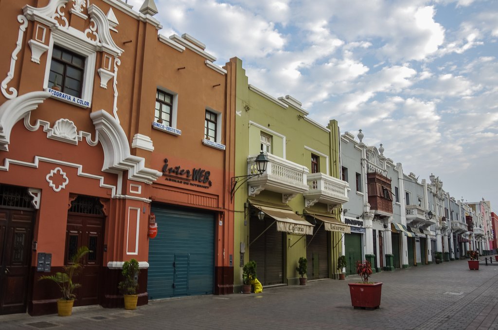 The colorful buildings of Trujillo are built in a Spanish style, reflecting the effect of the conquest