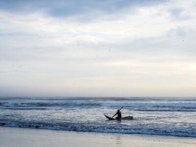 The Fisherman Goes To Sea On A Traditional Peruvian Small Reed B
