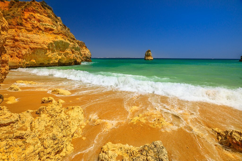 Sandstone formations at Camilo Beach (two beaches connected through a tunnel)