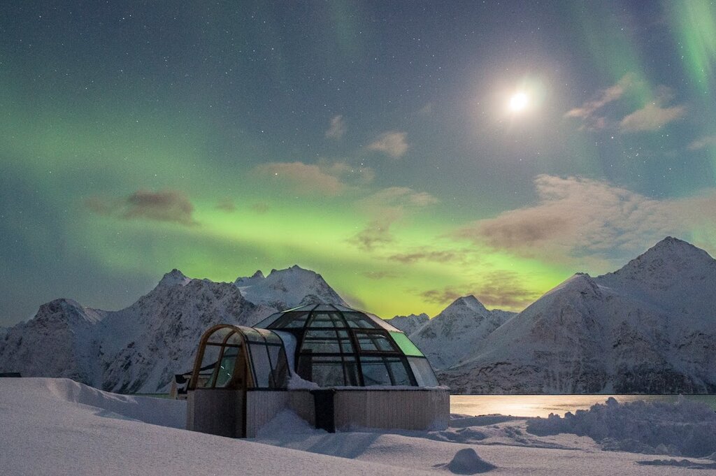 Spot the northern lights from ice hotels and glass igloos as you adventure above the Arctic Circle (photo courtesy of Lyngen North)
