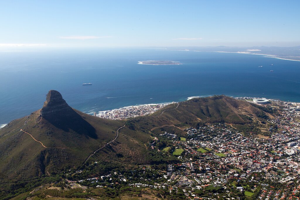 Cape Town city bowl below Signal Hill and Lion's Head with Robben Island across Table Bay