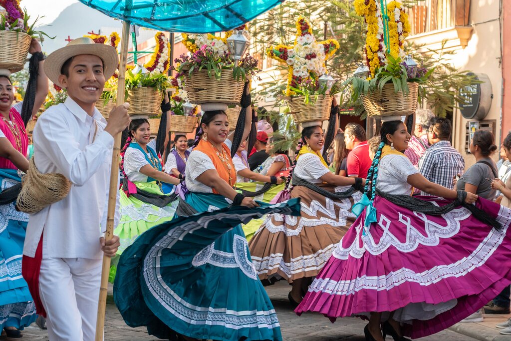 Mexico, Oaxaca - Locals dressed in traditional clothes during a Guelaguetza