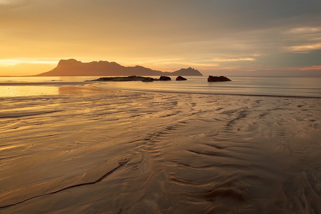 Travel to remote beaches in Malaysian Borneo, unobstructed by crowds and urban development