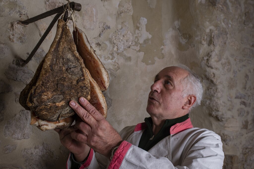 Butcher with his ham