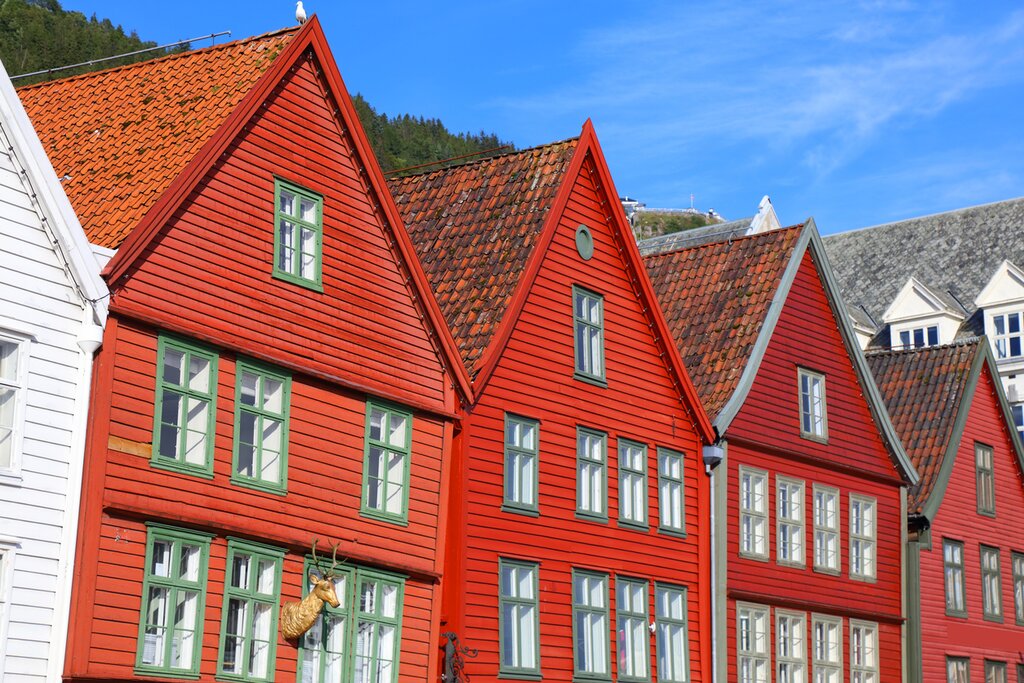 Walk along Bergen's historic wharf to admire the colorful buildings