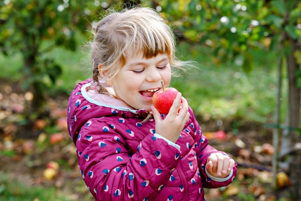 Girl eating apple
