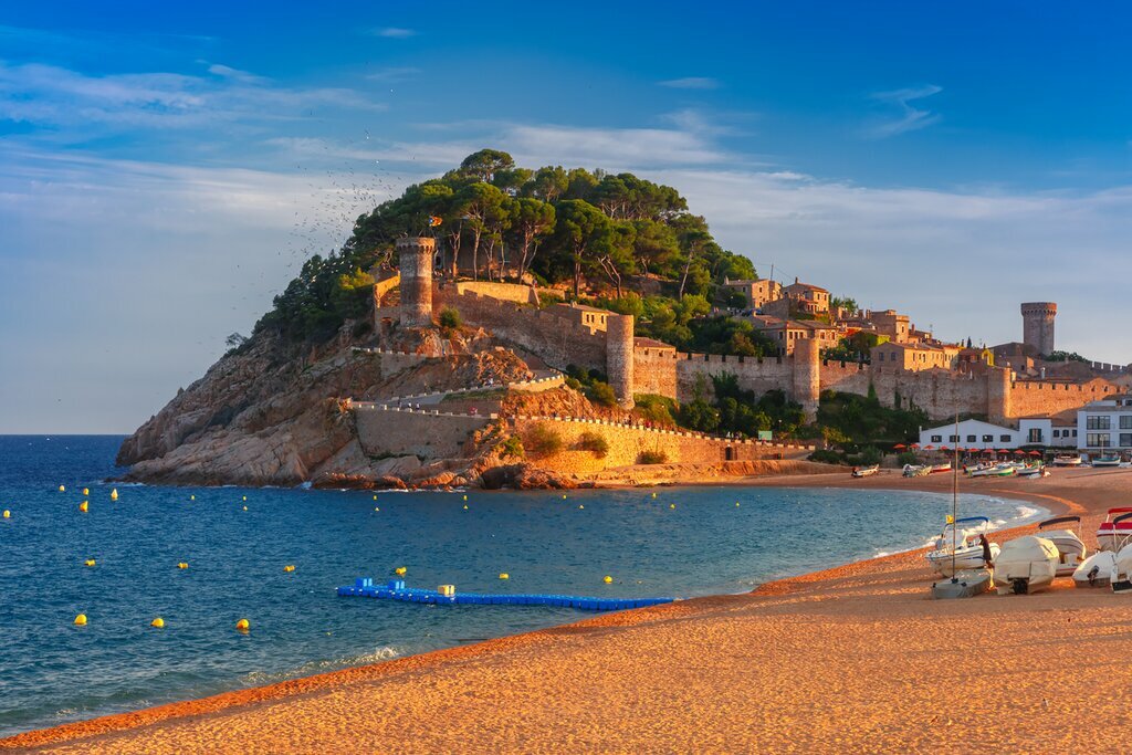 Visit beaches and medieval towns along the Costa Brava
