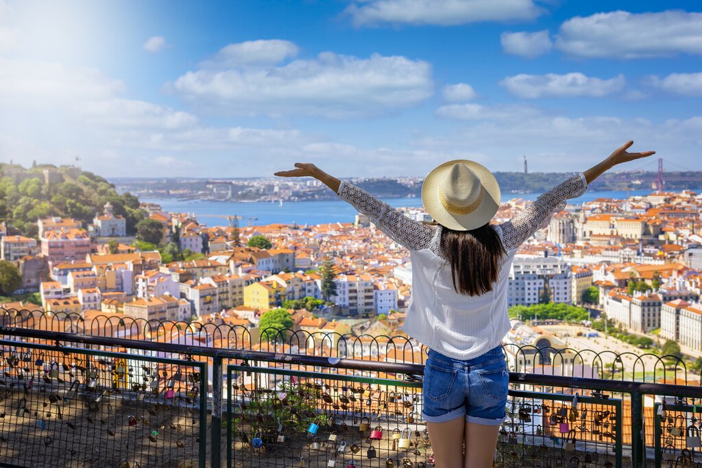 Woman with views of Lisbon
