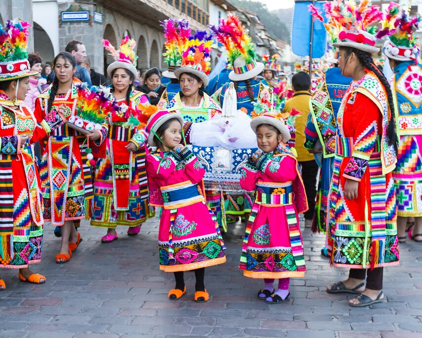 Children participate in local festivities in Cusco