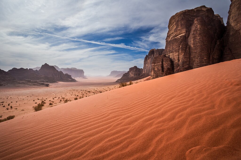 Camp overnight in the red-sand desert of Wadi Rum