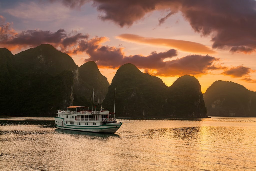 Cruise along the emerald waters of Ha Long Bay in Northern Vietnam