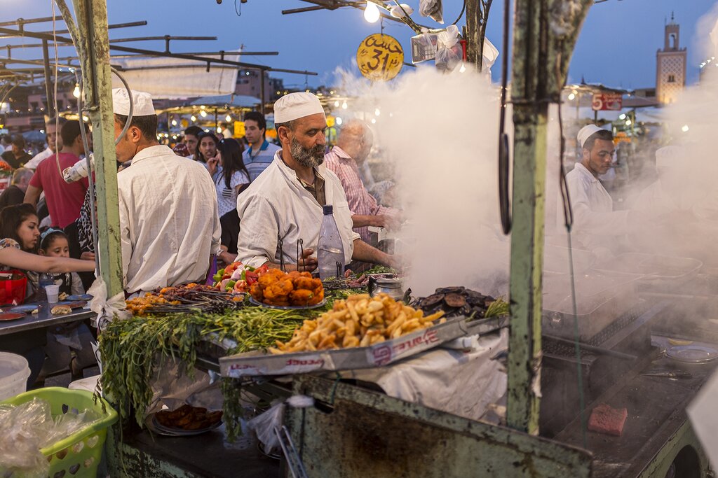 A cook at a food stall in Jemaa el-Fnaa, the main square of Marrakesh