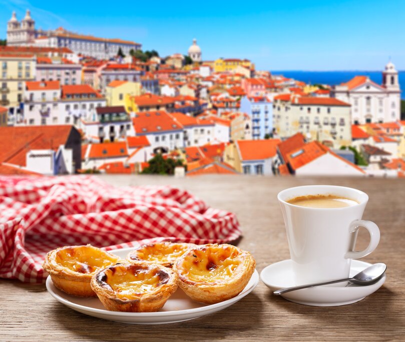 Enjoy a Pastéis de Belém and coffee in Lisbon