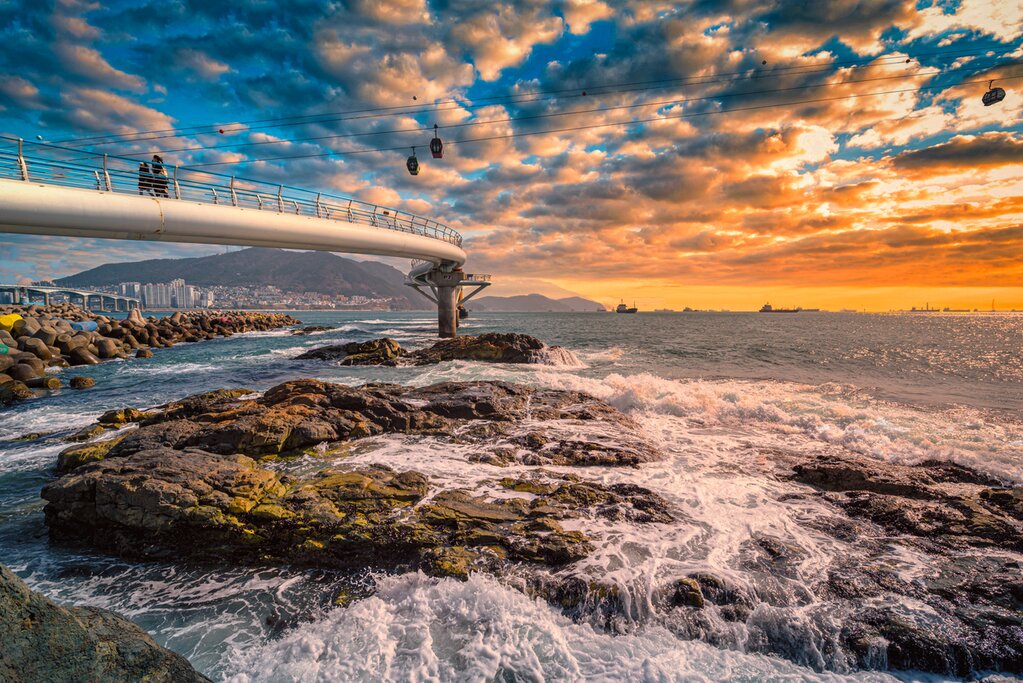 Discover South Korea history and culture on a cross-country tour, stopping for views at Busan's Songdo Skywalk