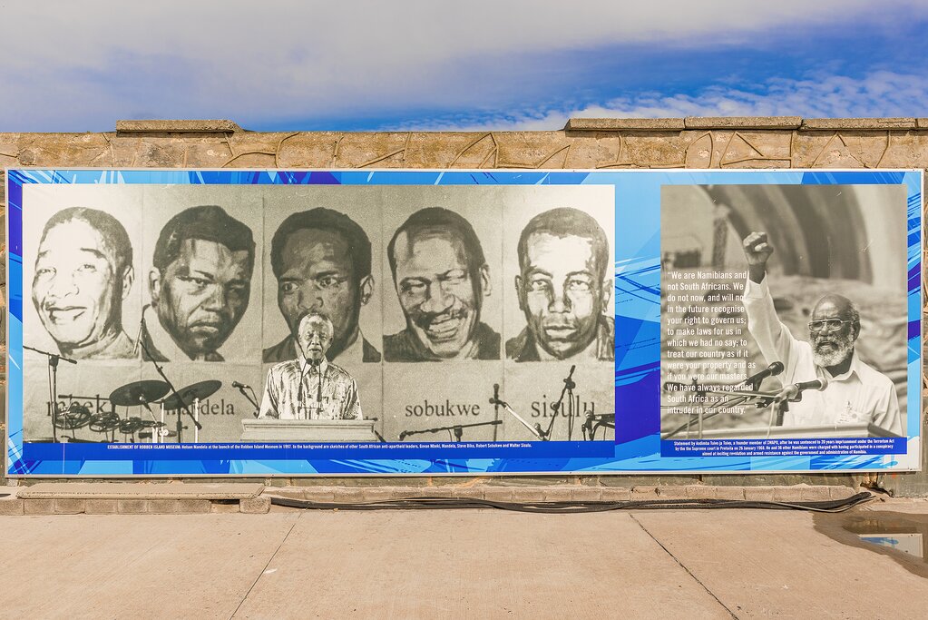 South Africa, Robben Island - Banner on the wall at the dock on Robben Island. Home to where Nelson Mandela was once imprisoned.j