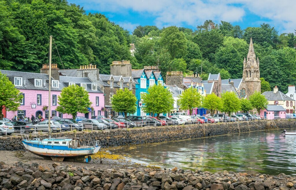Wander along the colorful architecture in Tobermory, on the Isle of Mull