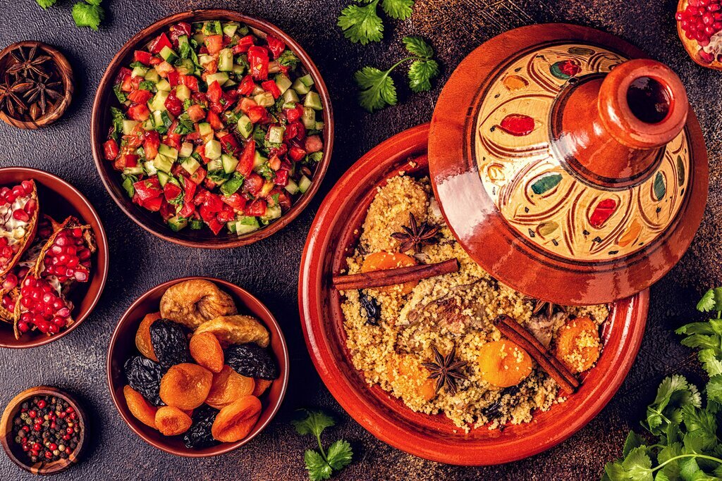 End your adventure in Marrakesh, sampling flavorful street food in the city's souks