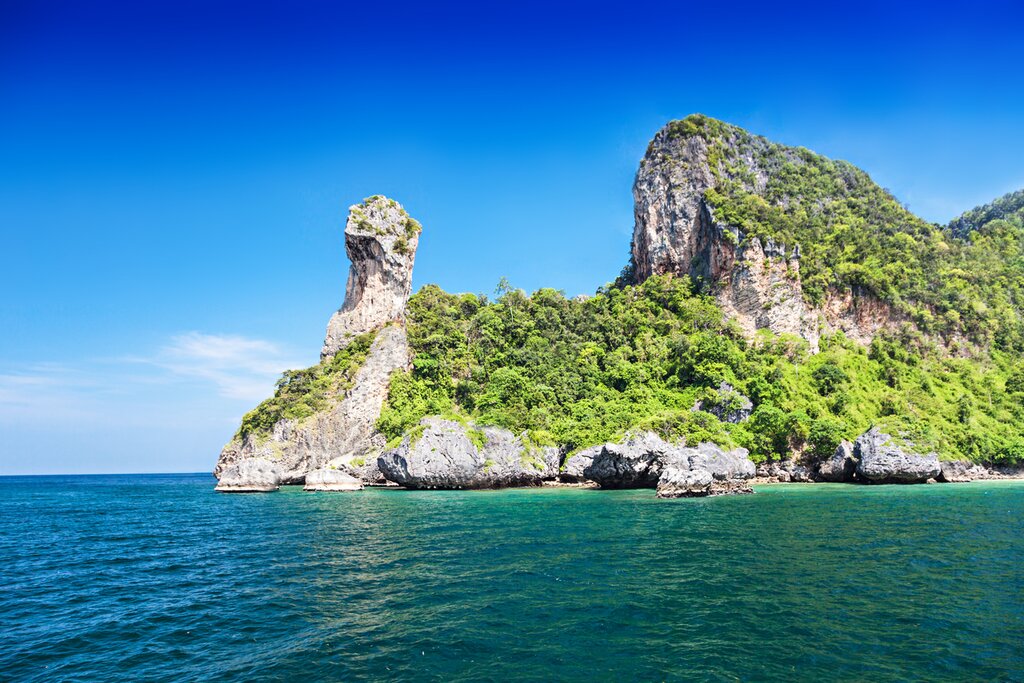 Photo of Ko Kai (Chicken Head Island) in the Krabi District, Thailand. Clear day, calm water
