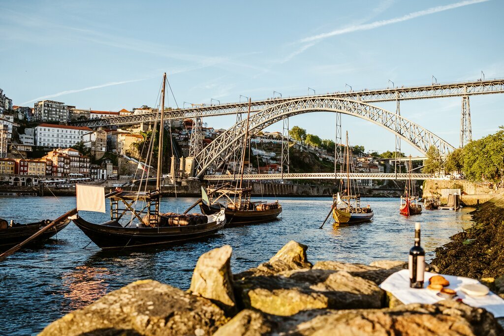 Sip port wine along the banks of Porto's Douro River
